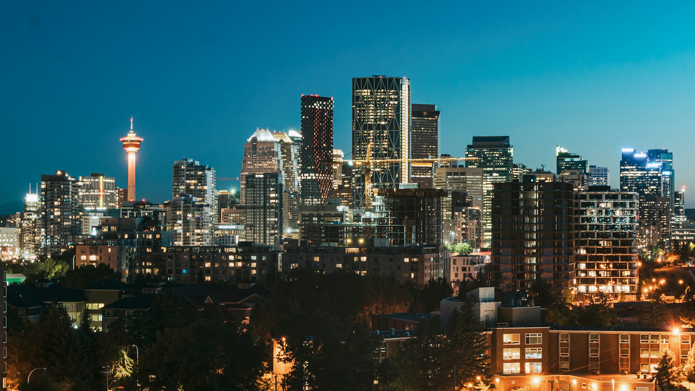 Downtown Calgary skyline and the Calgary Tower at night